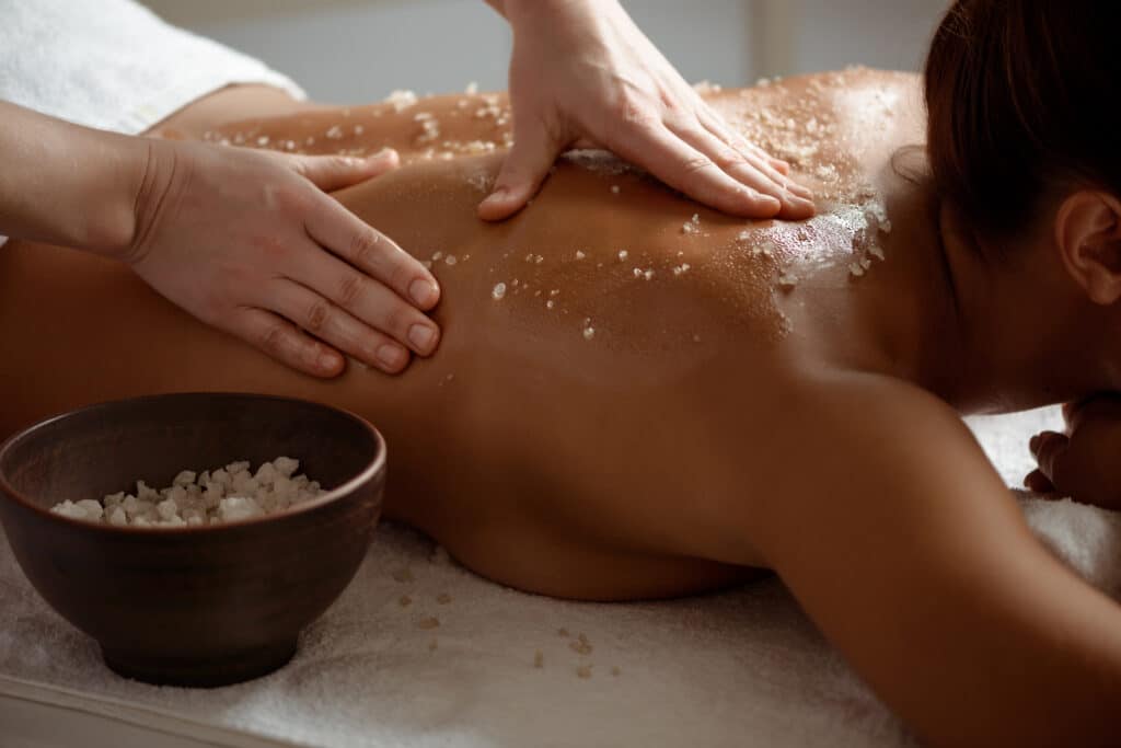 young beautiful girl relaxing in spa salon.